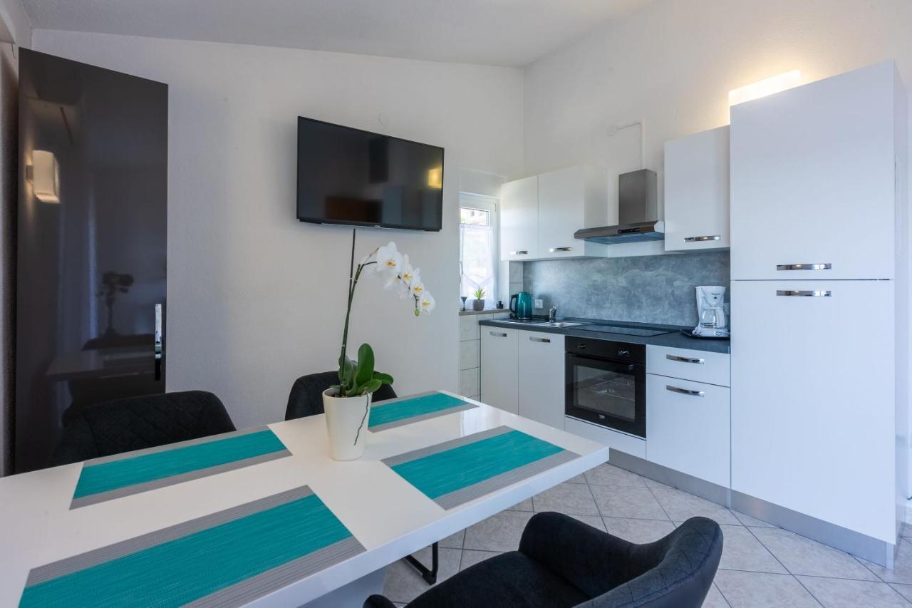 Apartments Porto Dramalj Bagian luar foto