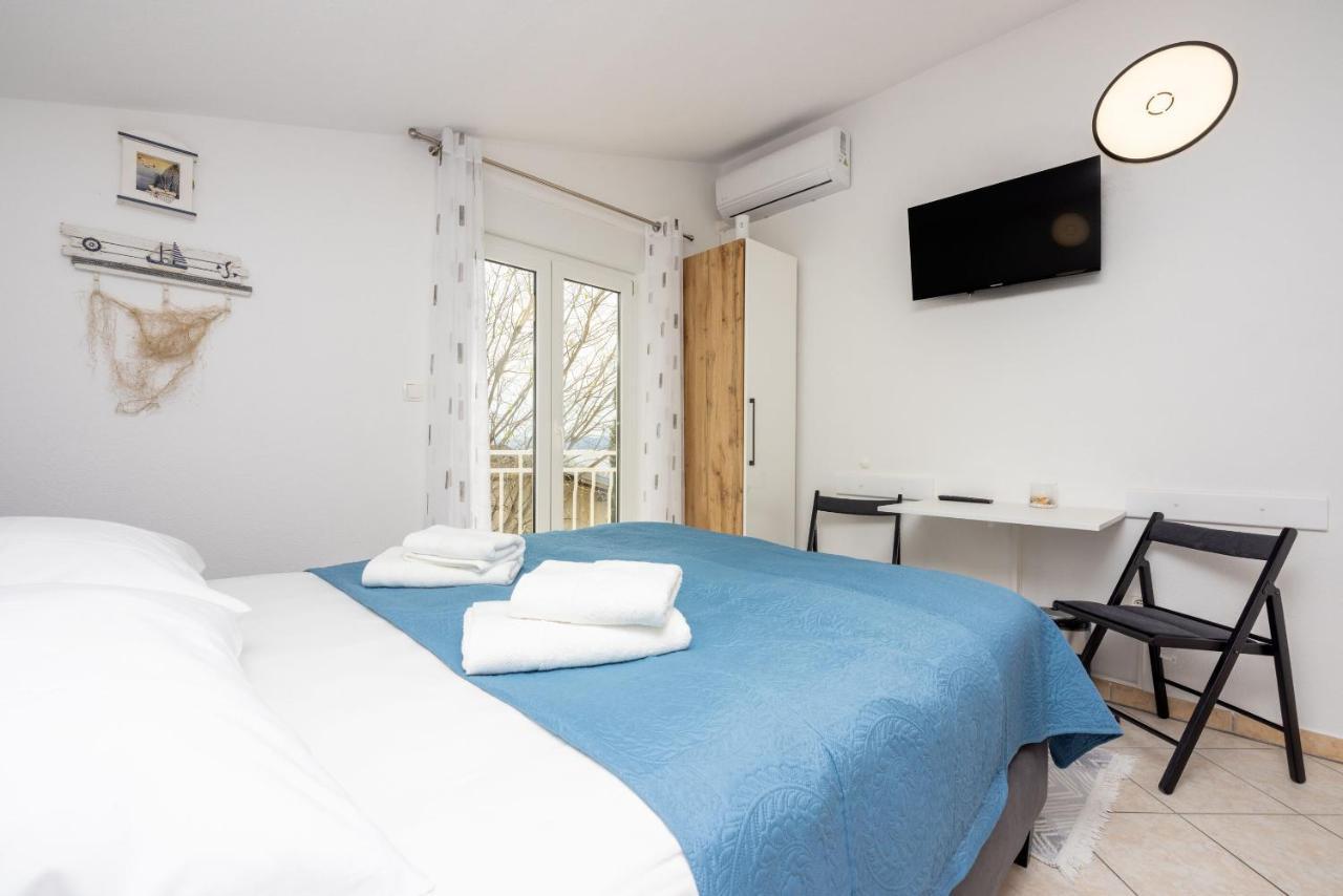 Apartments Porto Dramalj Bagian luar foto